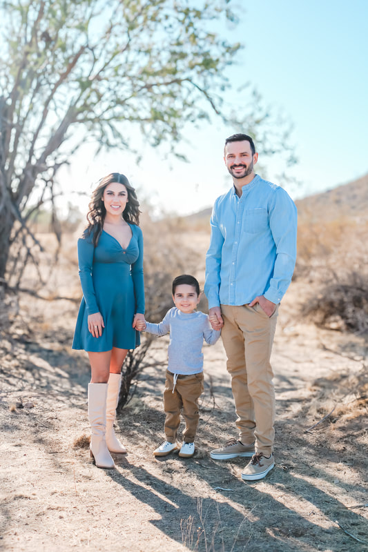 Couple and child in the desert